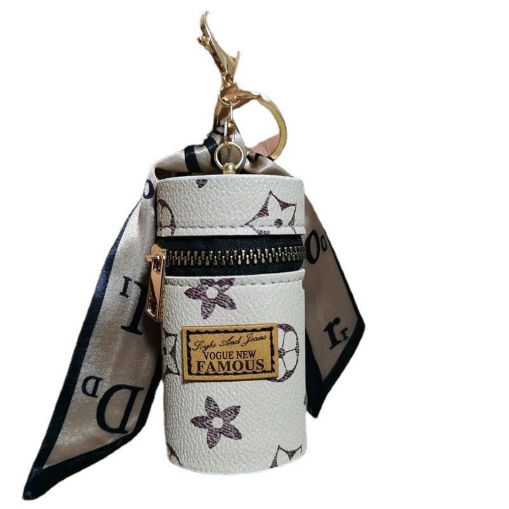 Monogram Keychain Leather - Черно-золотой цилиндрический мини-футляр для помады Off-White